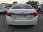 2017 Toyota Corolla L Белый vin: 5YFBURHE3HP614558