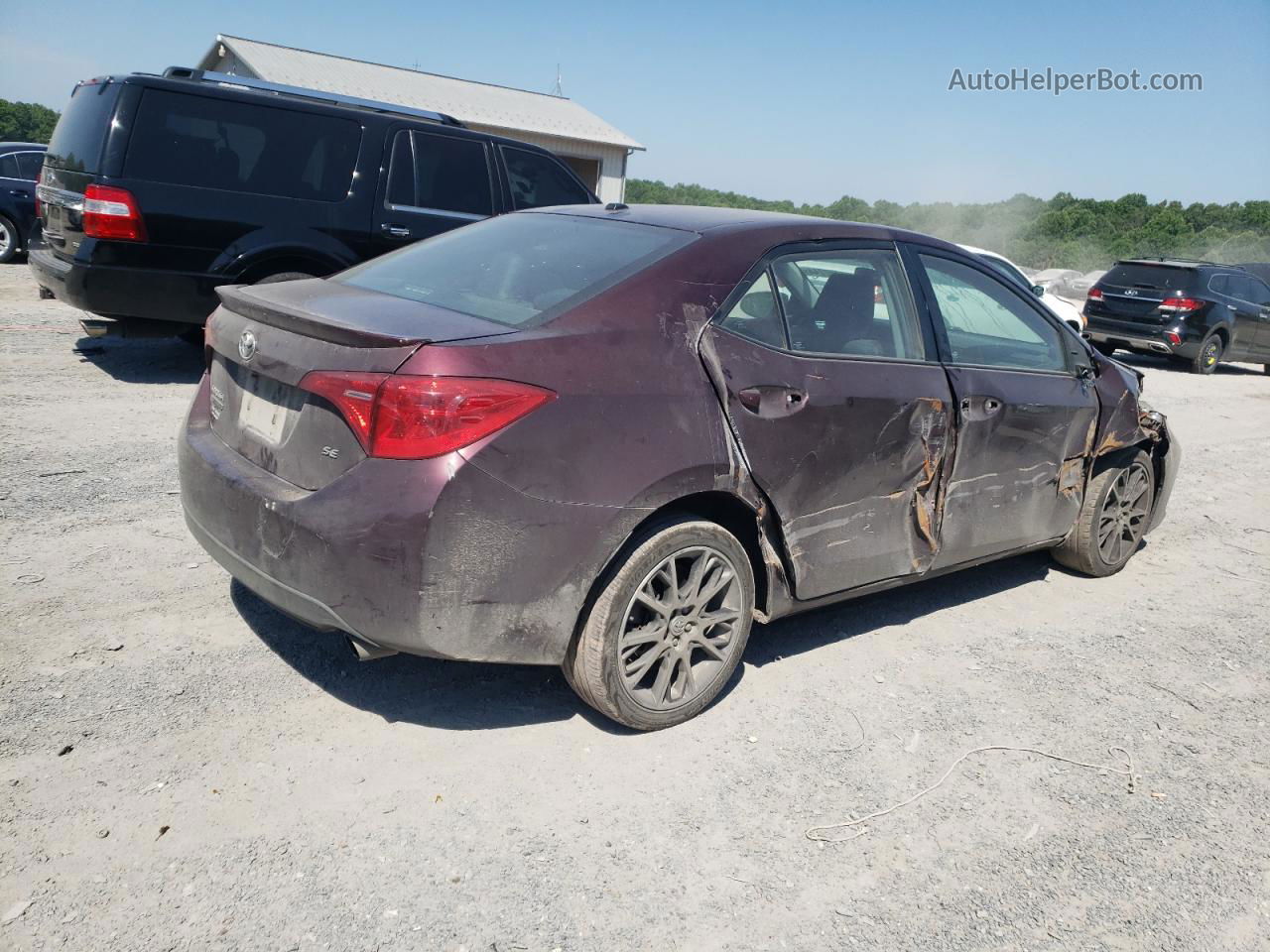 2017 Toyota Corolla L Burgundy vin: 5YFBURHE3HP615614