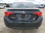 2017 Toyota Corolla L Black vin: 5YFBURHE6HP597058