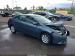 2015 Toyota Corolla   Серый vin: 5YFBURHE7FP203564