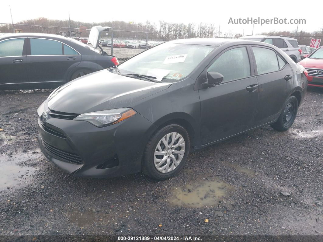 2017 Toyota Corolla Le Black vin: 5YFBURHE7HP611758