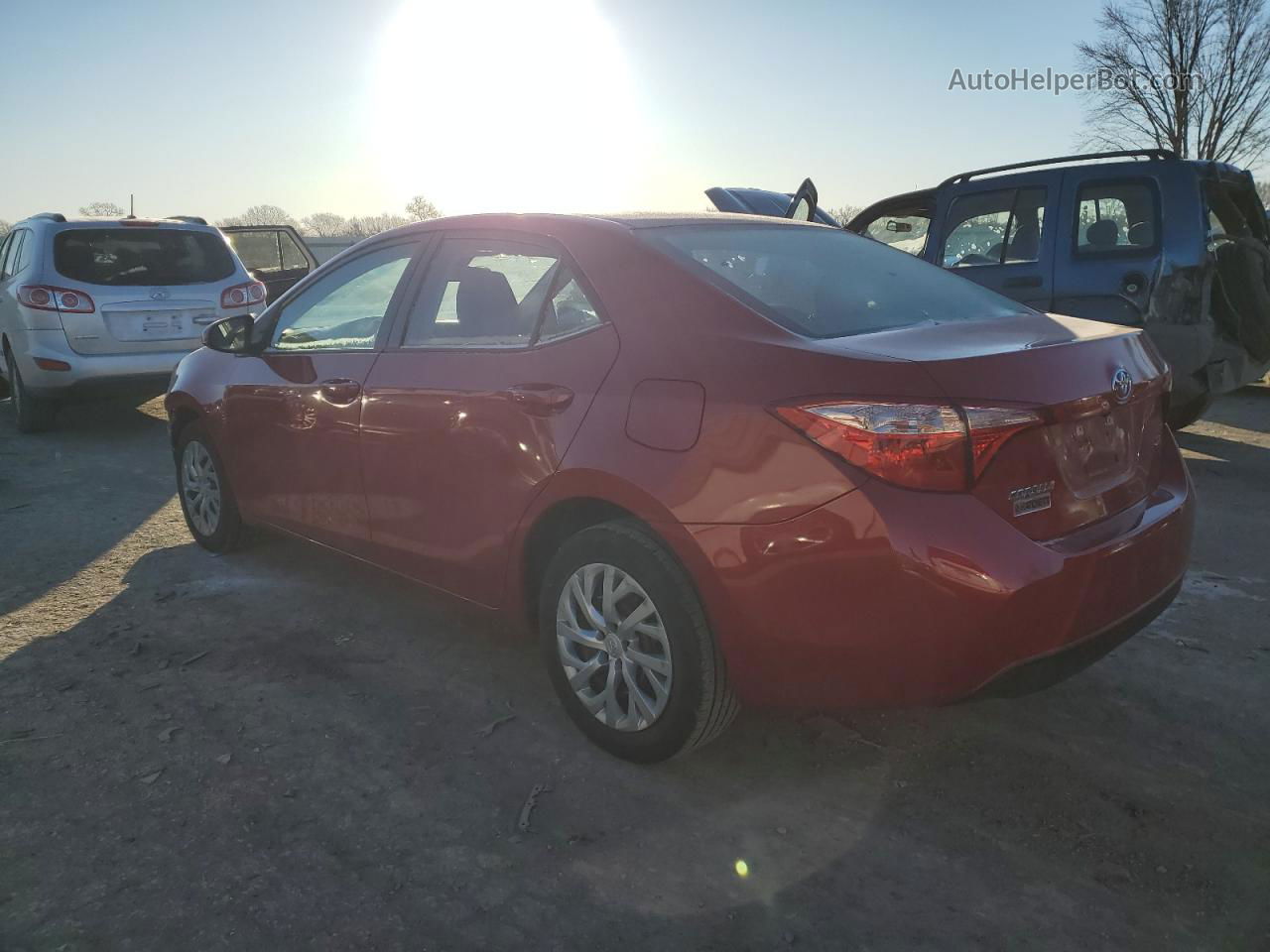 2017 Toyota Corolla L Red vin: 5YFBURHE7HP657073