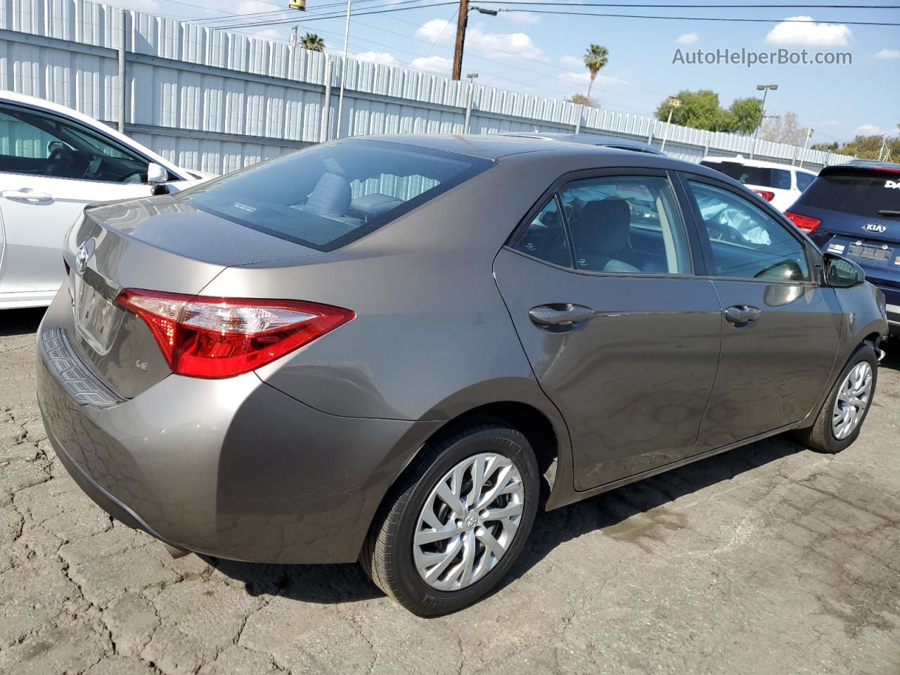 2019 Toyota Corolla L Tan vin: 5YFBURHE7KP910254