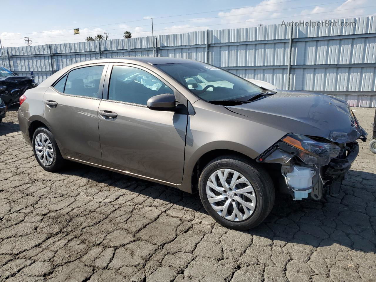 2019 Toyota Corolla L Tan vin: 5YFBURHE7KP910254