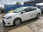 2017 Toyota Corolla L White vin: 5YFBURHE8HP678076