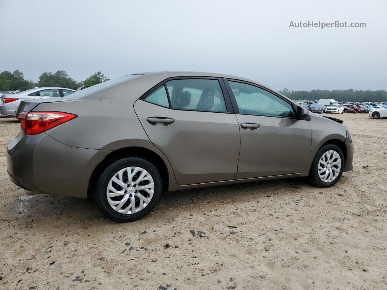 2019 Toyota Corolla L Tan vin: 5YFBURHE9KP902947