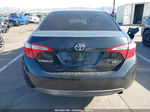 2016 Toyota Corolla Le Black vin: 5YFBURHEXGP414825