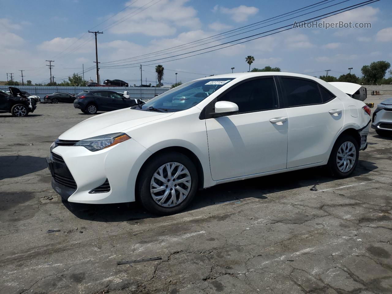 2017 Toyota Corolla L White vin: 5YFBURHEXHP692478