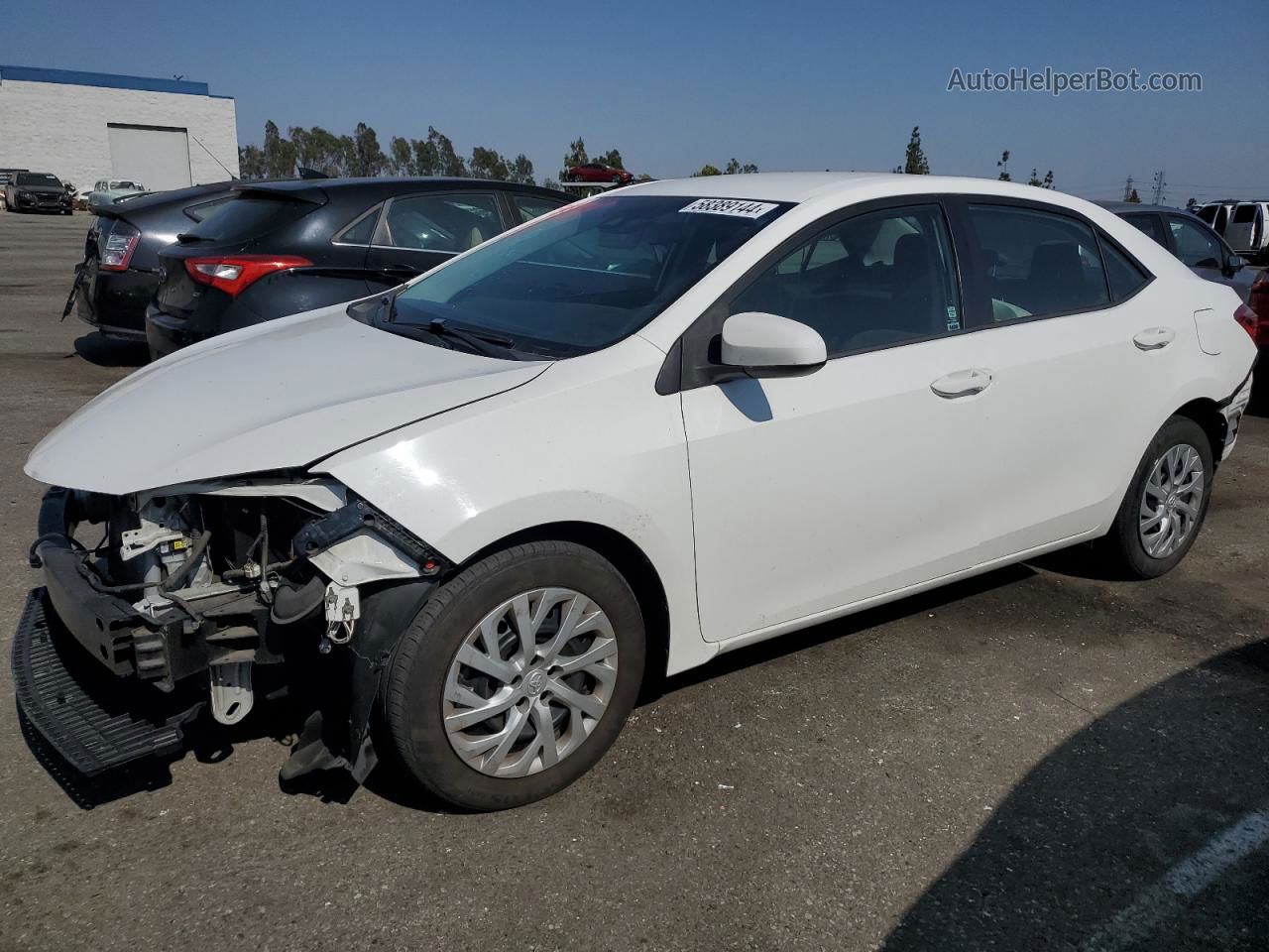 2017 Toyota Corolla L White vin: 5YFBURHEXHP698457