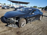 2016 Tesla Model S  Черный vin: 5YJSA1E17GF132956