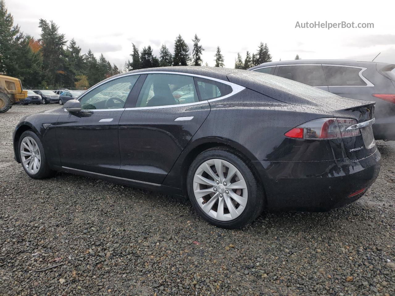 2016 Tesla Model S  Черный vin: 5YJSA1E17GF158828