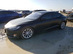 2016 Tesla Model S  Черный vin: 5YJSA1E21GF143640