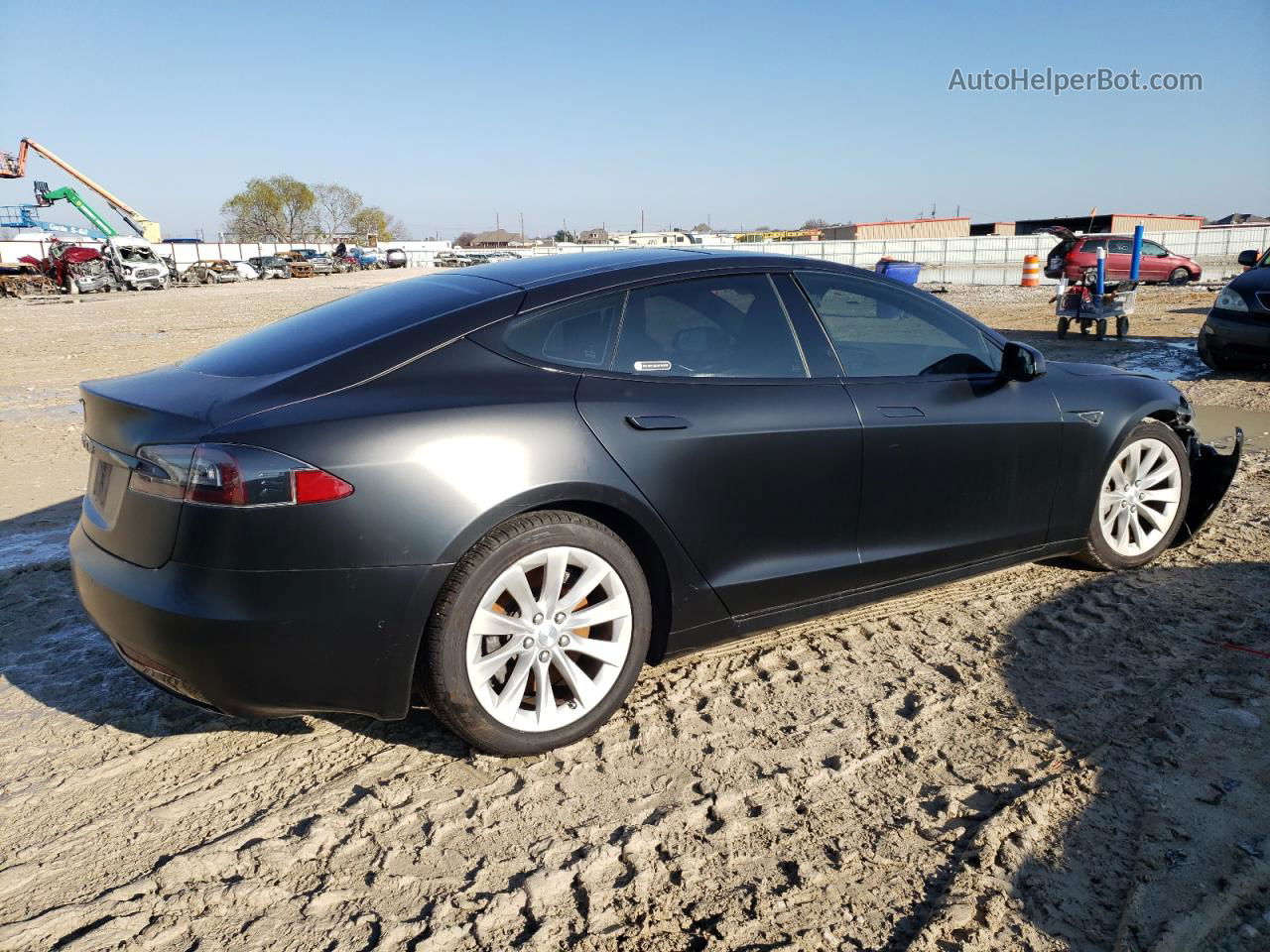 2016 Tesla Model S  Черный vin: 5YJSA1E21GF143640