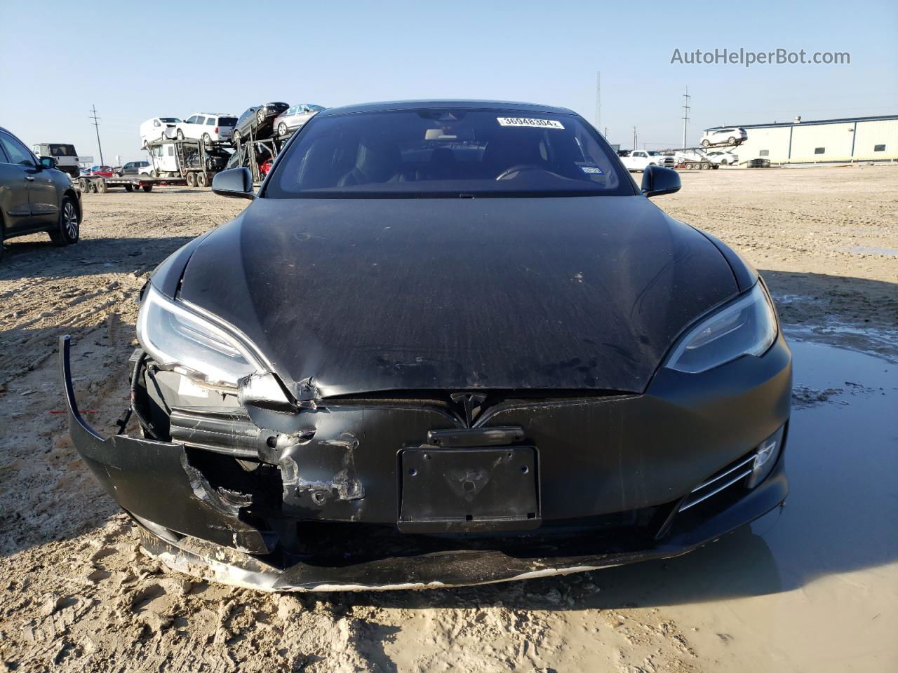2016 Tesla Model S  Черный vin: 5YJSA1E21GF143640