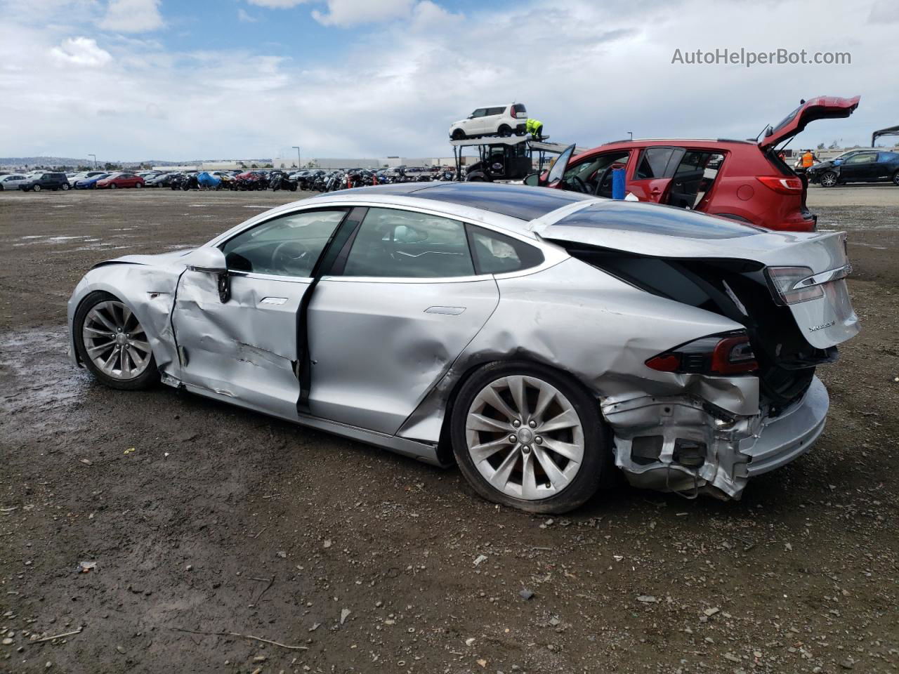 2016 Tesla Model S  Серебряный vin: 5YJSA1E21GF156811