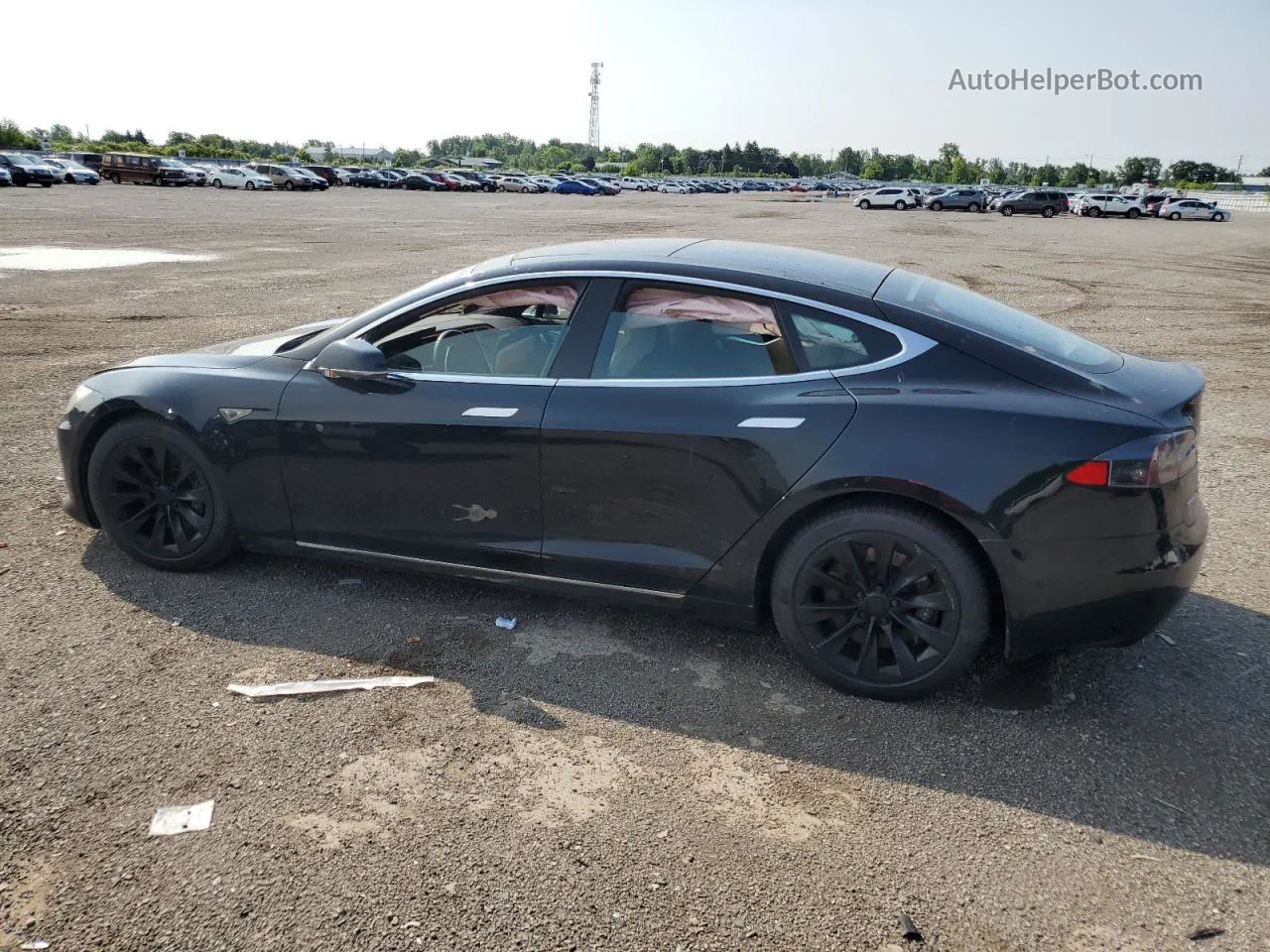 2016 Tesla Model S  Черный vin: 5YJSA1E25GF149361