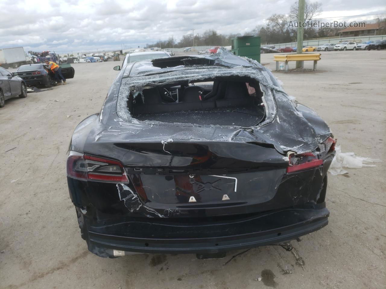 2016 Tesla Model S  Черный vin: 5YJSA1E25GF153913