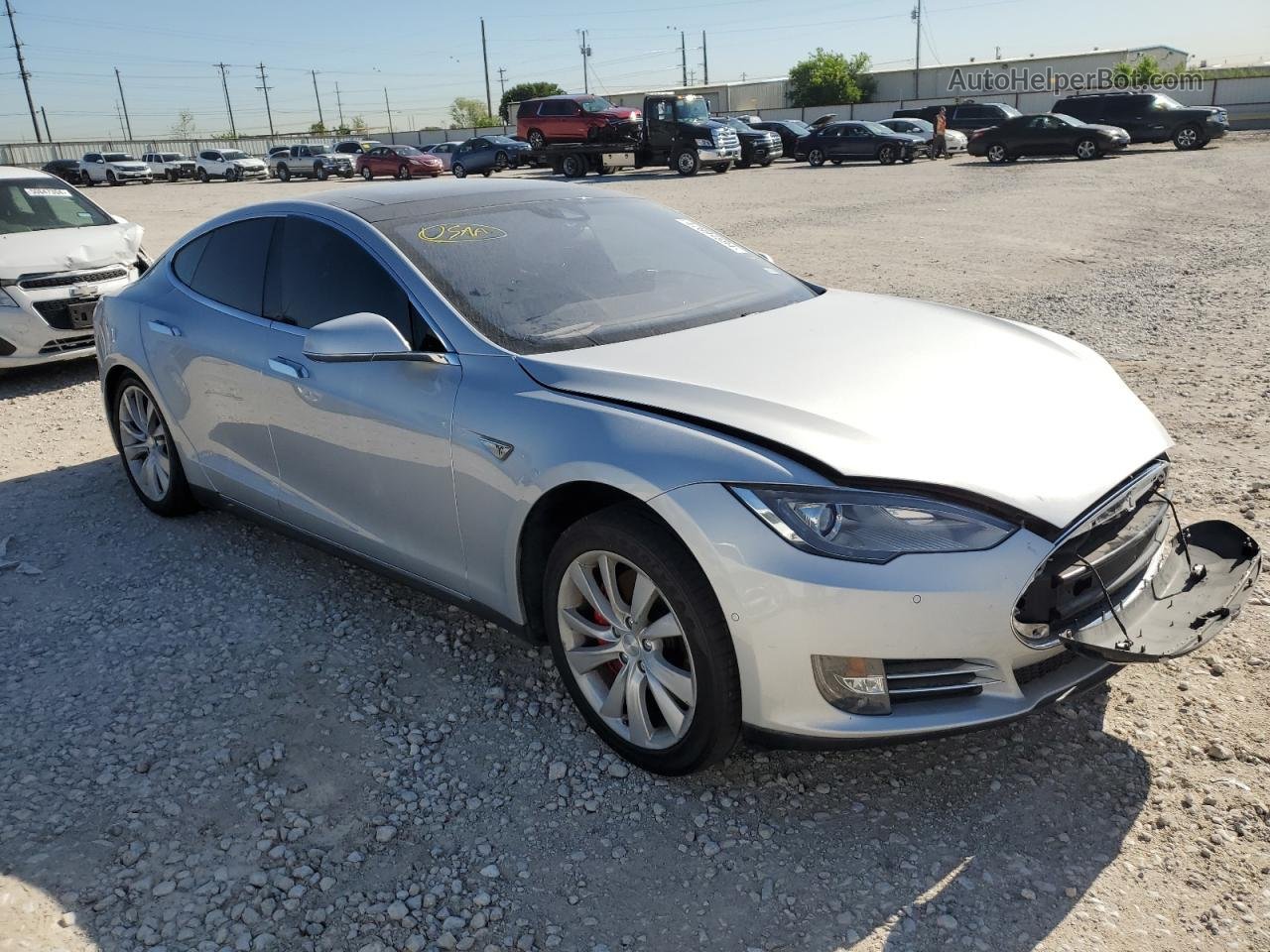 2015 Tesla Model S  Серебряный vin: 5YJSA1E47FF111839