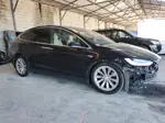 2016 Tesla Model X  Черный vin: 5YJXCBE25GF005394