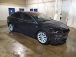 2018 Tesla Model X  Черный vin: 5YJXCDE2XJF089988