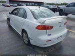 2009 Mitsubishi Lancer   White vin: JA3AU26U09U042025