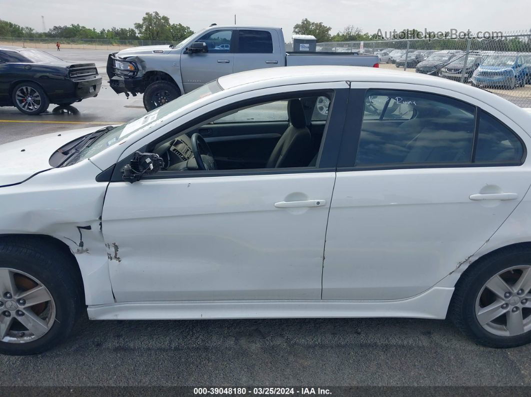 2009 Mitsubishi Lancer   White vin: JA3AU26U09U042025