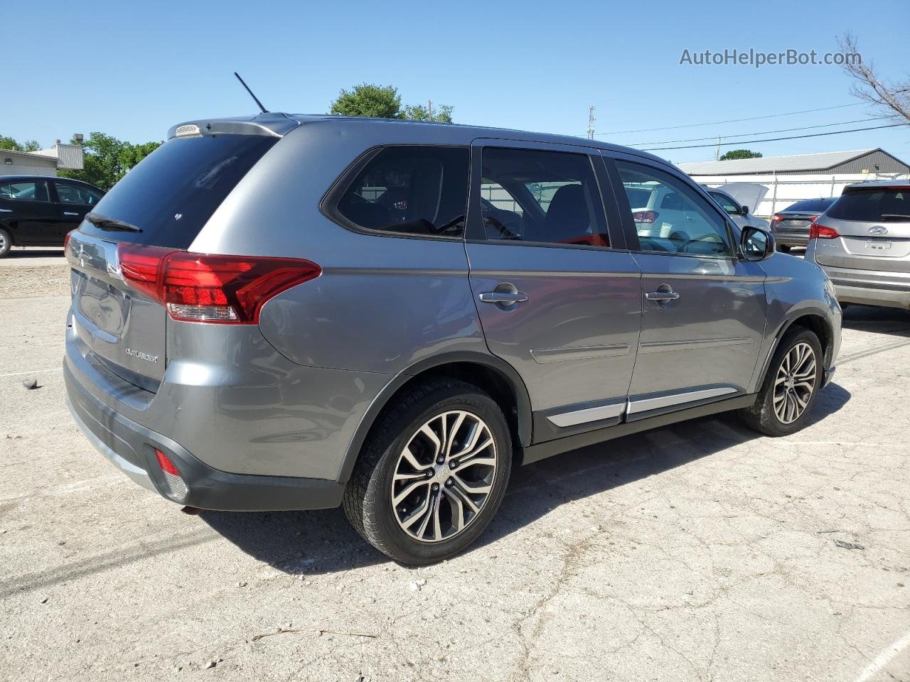 2016 Mitsubishi Outlander Es Silver vin: JA4AD2A34GZ008020