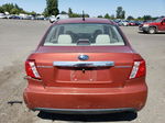 2009 Subaru Impreza 2.5i Premium Orange vin: JF1GE60639H521189