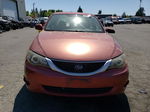 2009 Subaru Impreza 2.5i Premium Orange vin: JF1GE60639H521189