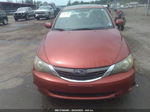 2009 Subaru Impreza 2.5i Orange vin: JF1GE60679G512145