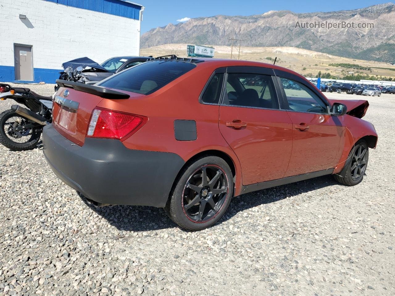 2009 Subaru Impreza 2.5i Orange vin: JF1GE61689H500613