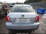 2009 Subaru Impreza 2.5i Серебряный vin: JF1GE61699G512551