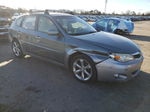 2009 Subaru Impreza Outback Sport Teal vin: JF1GH63609H822165