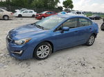 2016 Subaru Impreza Premium Blue vin: JF1GJAB69GH002107