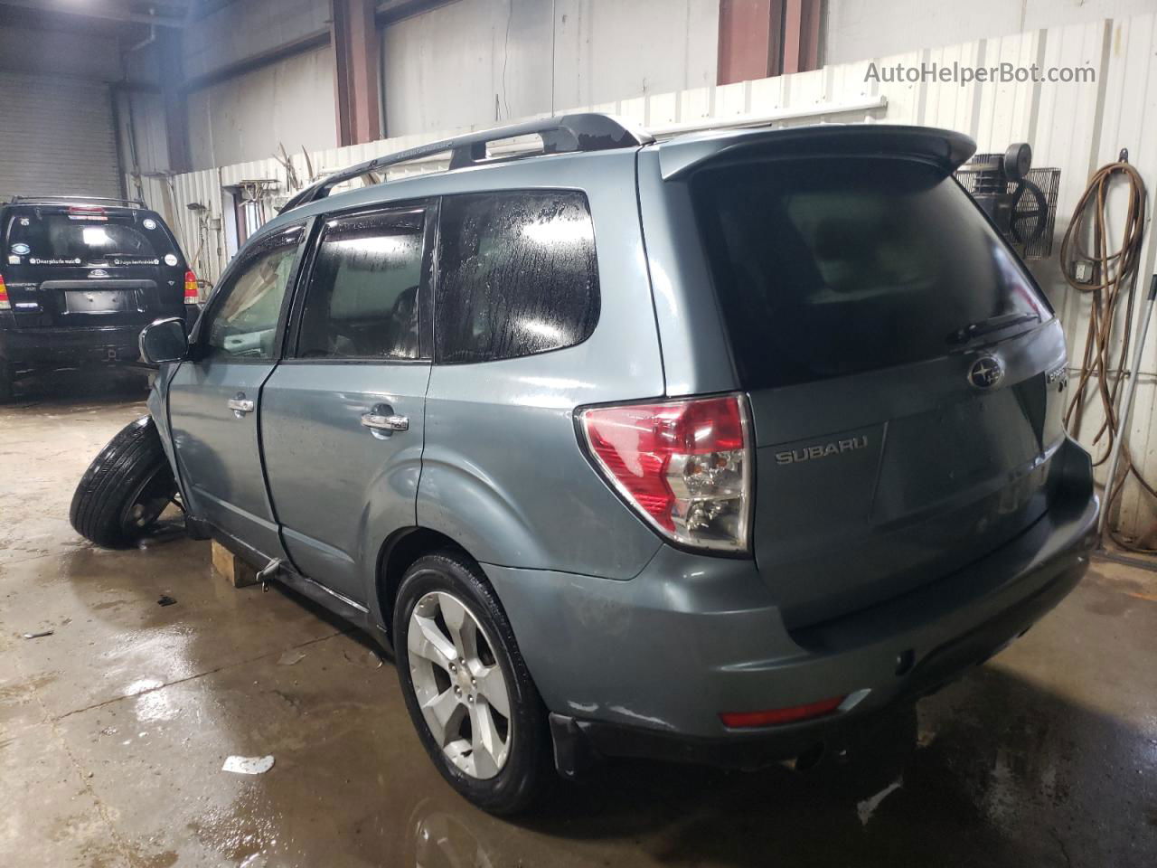 2009 Subaru Forester 2.5xt Limited Blue vin: JF2SH66659H743351