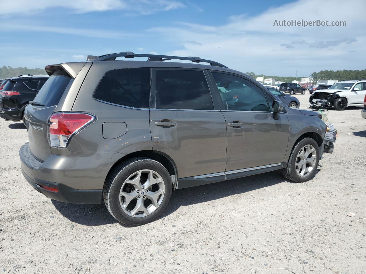 2018 Subaru Forester 2.5i Touring Желто-коричневый vin: JF2SJAWC6JH582915