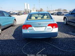 2006 Honda Civic Hybrid   Blue vin: JHMFA36206S030015