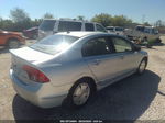 2006 Honda Civic Hybrid   Light Blue vin: JHMFA36216S029312