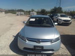 2006 Honda Civic Hybrid   Light Blue vin: JHMFA36216S029312