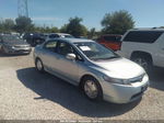 2006 Honda Civic Hybrid   Light Blue vin: JHMFA36216S029312