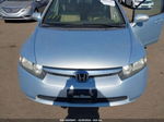 2006 Honda Civic Hybrid   Light Blue vin: JHMFA36236S004329