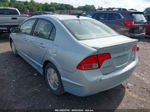 2006 Honda Civic Hybrid   Light Blue vin: JHMFA36266S003515