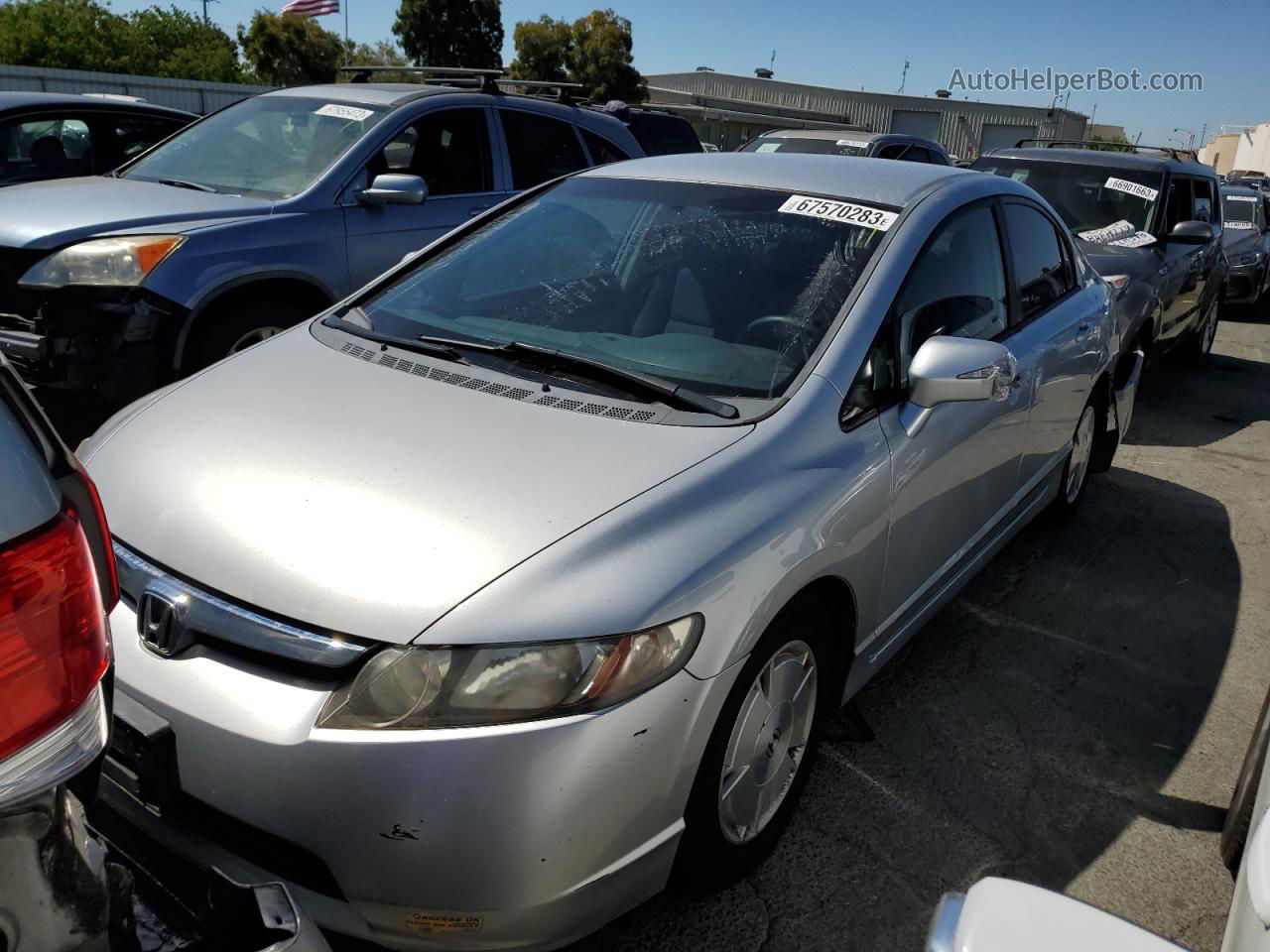 2006 Honda Civic Hybrid Серебряный vin: JHMFA36266S010853