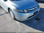 2006 Honda Civic Hybrid   Light Blue vin: JHMFA36266S021514