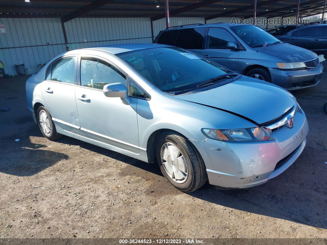 2006 Honda Civic Hybrid   Light Blue vin: JHMFA362X6S026165