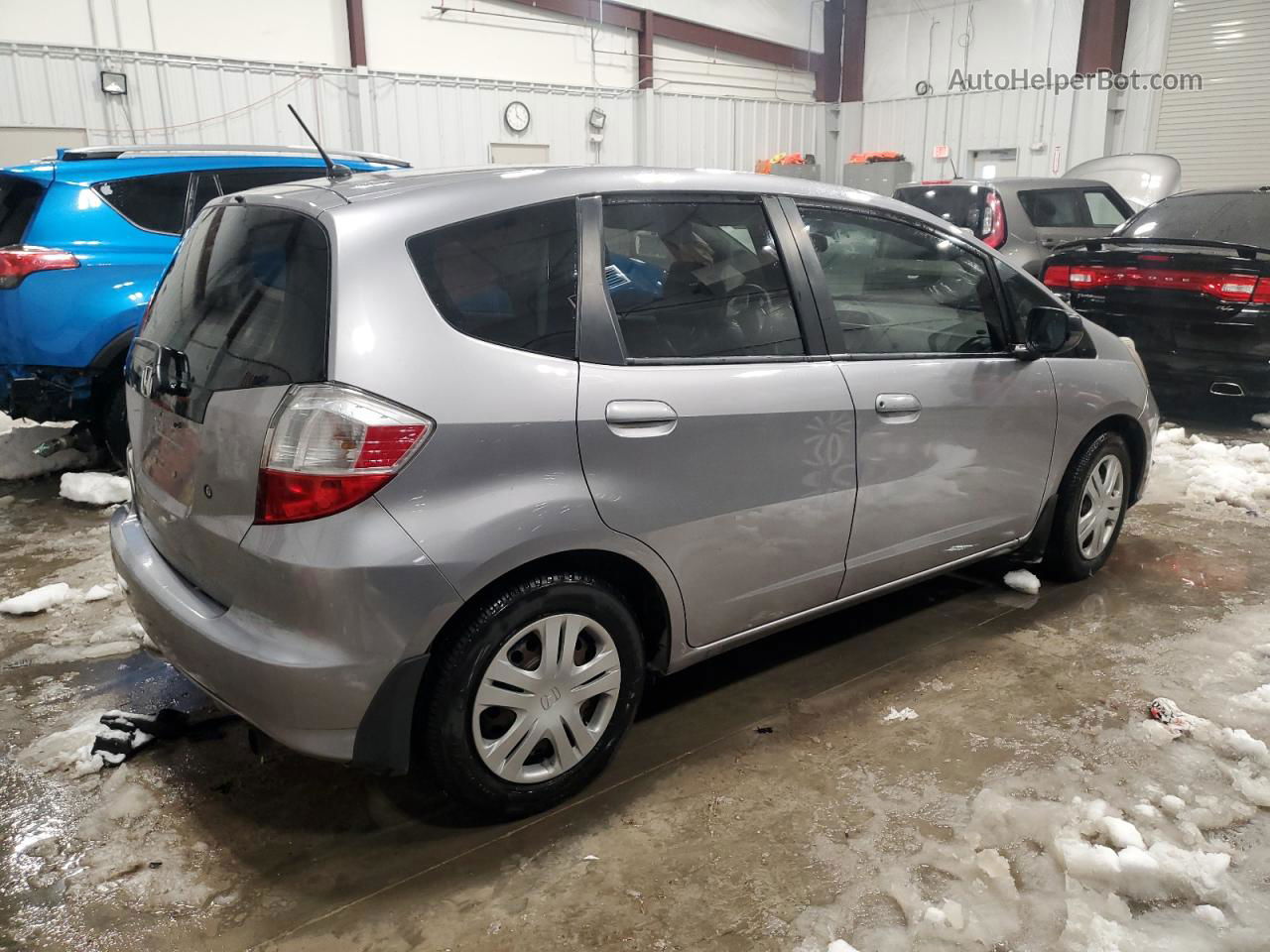 2009 Honda Fit  Silver vin: JHMGE87219C006731