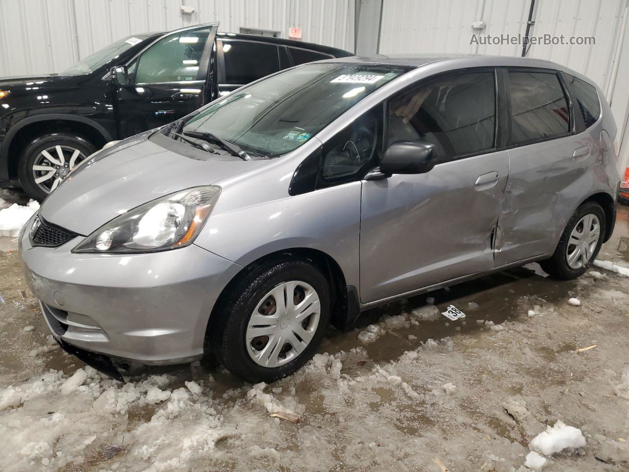 2009 Honda Fit  Silver vin: JHMGE87219C006731