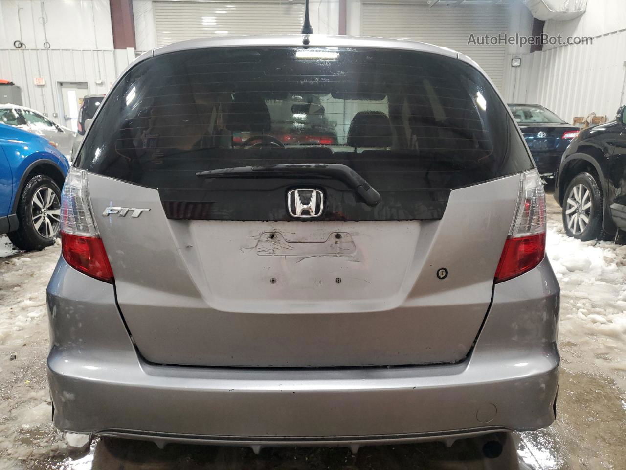 2009 Honda Fit  Silver vin: JHMGE87219C006731