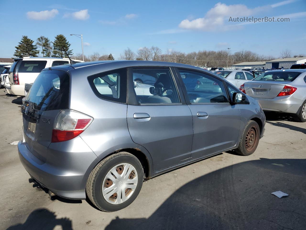 2009 Honda Fit  Silver vin: JHMGE87219S040321