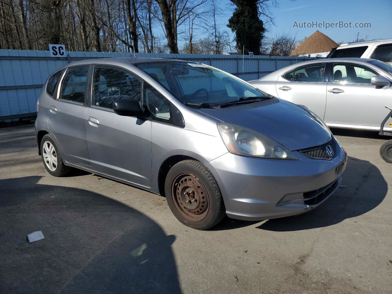 2009 Honda Fit  Silver vin: JHMGE87219S040321